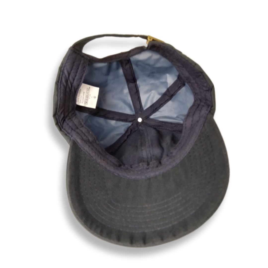 Hueso/gorra azul impermeable