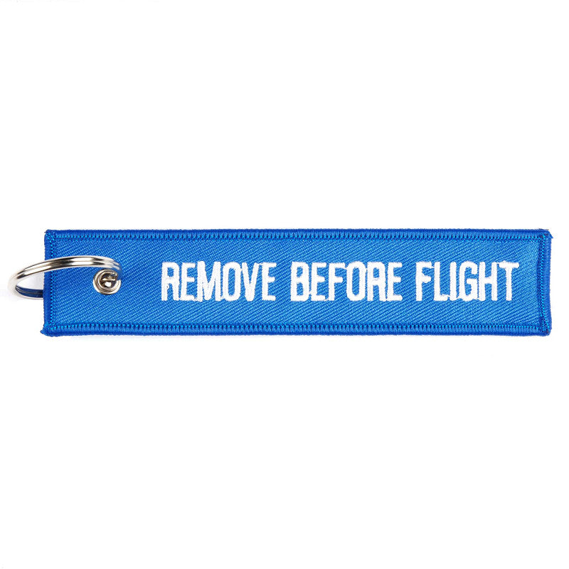 Porta-chave remove before flight