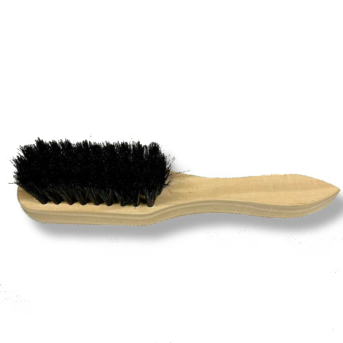 Small brush for applying grease