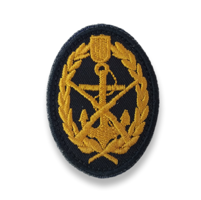 Insignia de boina marina con parche ovalado