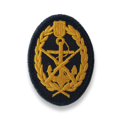 Insignia de boina marina con parche ovalado